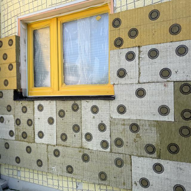 Reused insulation on the outside of a building as part of Drastic's German Demonstrator's work.