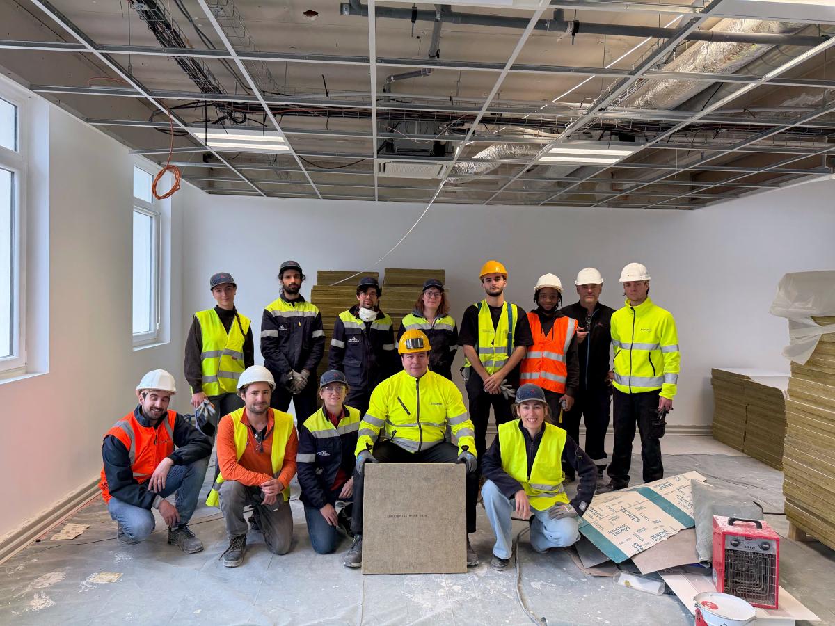 French Demonstrator ceiling tiles installation team.