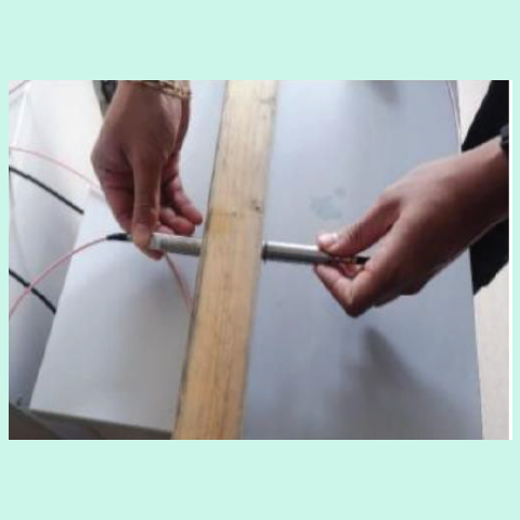 Measurement of wave velocities through the thinner section of the test specimen.
